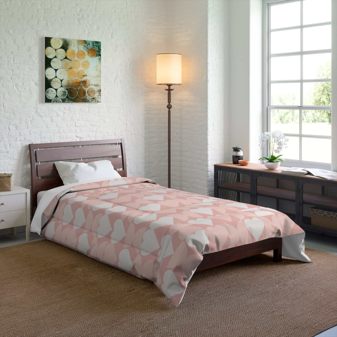 Pink Love Comforter on bed in cozy modern bedroom with natural light