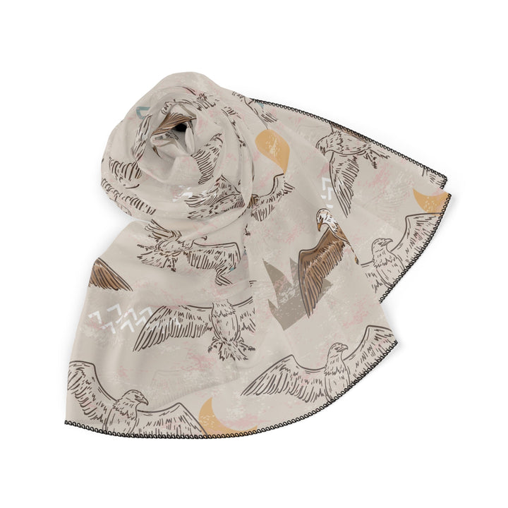 Sheer Eagle Soaring Poly Scarf in light beige with eagle print and black stitching, lightweight polyester voile and chiffon fabric
