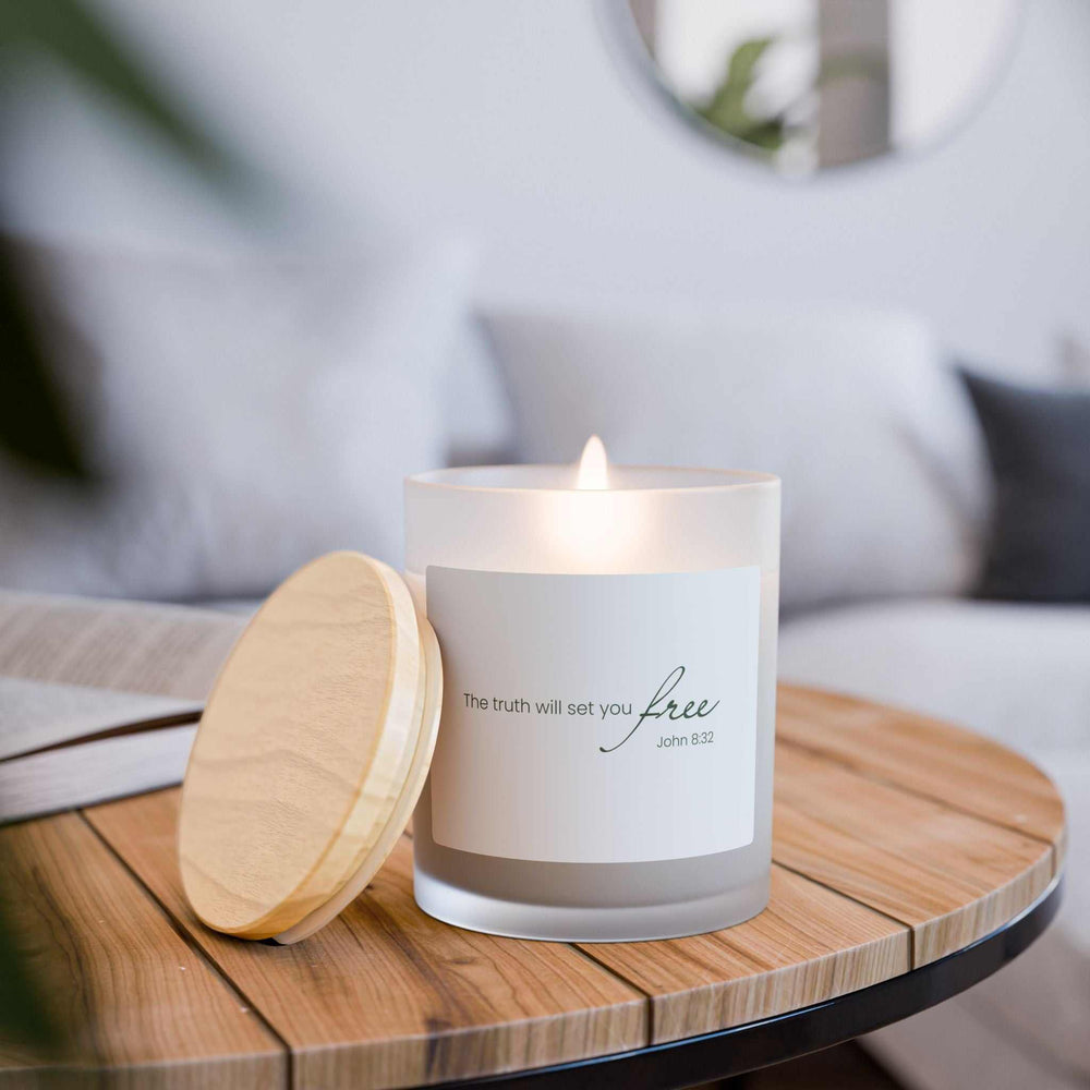 Lit Truth = Freedom glass candle with wooden wick and maple lid on wooden tray