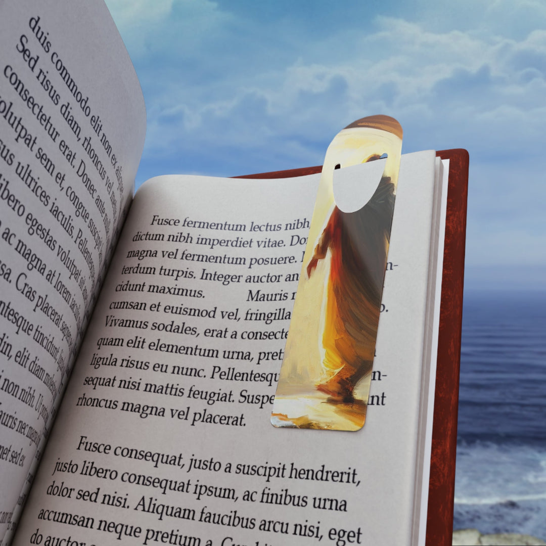Jesus Christ aluminum bookmark holding a page in an open book against ocean background