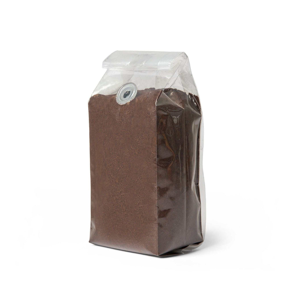 Believe In Miracles Coffee light roast ground coffee in a 12oz resealable bag with a valve, featuring dried fruit and citrus notes from Central America.