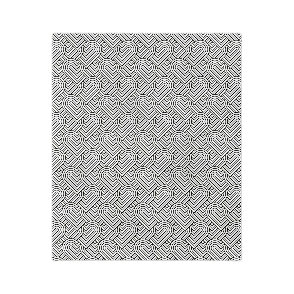 Colorful hearts blanket with black and white geometric heart design on soft fleece fabric