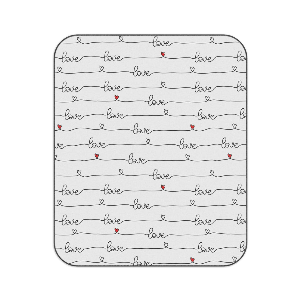 Christian picnic blanket with love text and hearts, soft polyester fleece top, water-resistant oxford cloth back, black carrying strap.