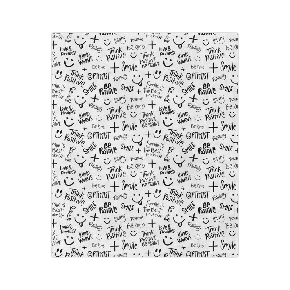 Think Positive Blanket with black positive words and smiley faces on white fleece fabric, soft and cozy with stitched edges