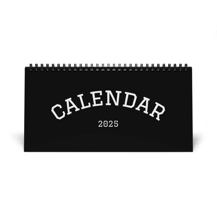 2025 desktop calendar with spiral binding and clear month grid