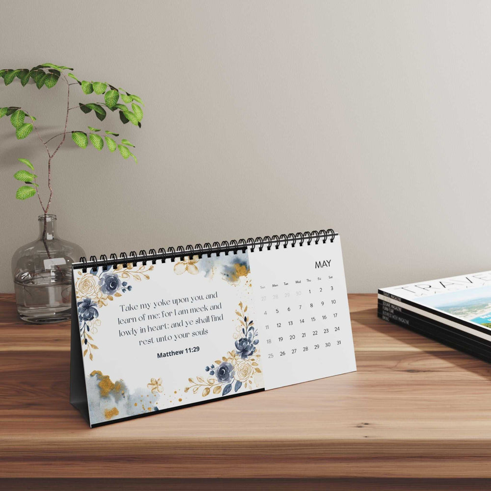 2025 spiral-bound desktop calendar with floral design and inspirational quote