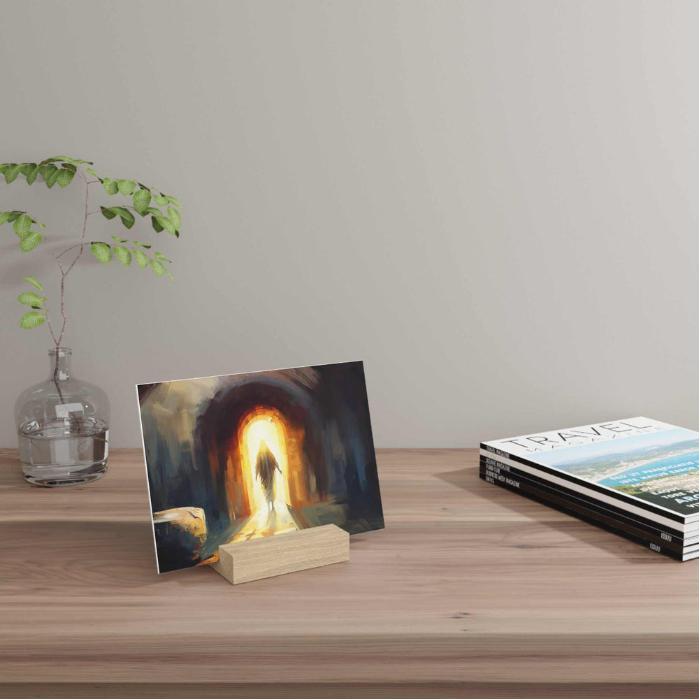 Jesus Christ Gallery Board with hand-crafted wooden stand on desk with plant and books