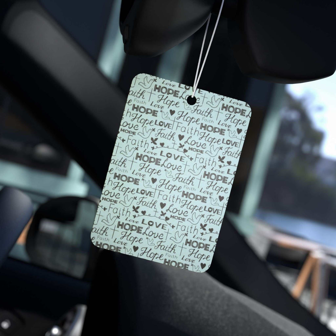 Faith Hope Love car air freshener hanging inside car with inspirational text design