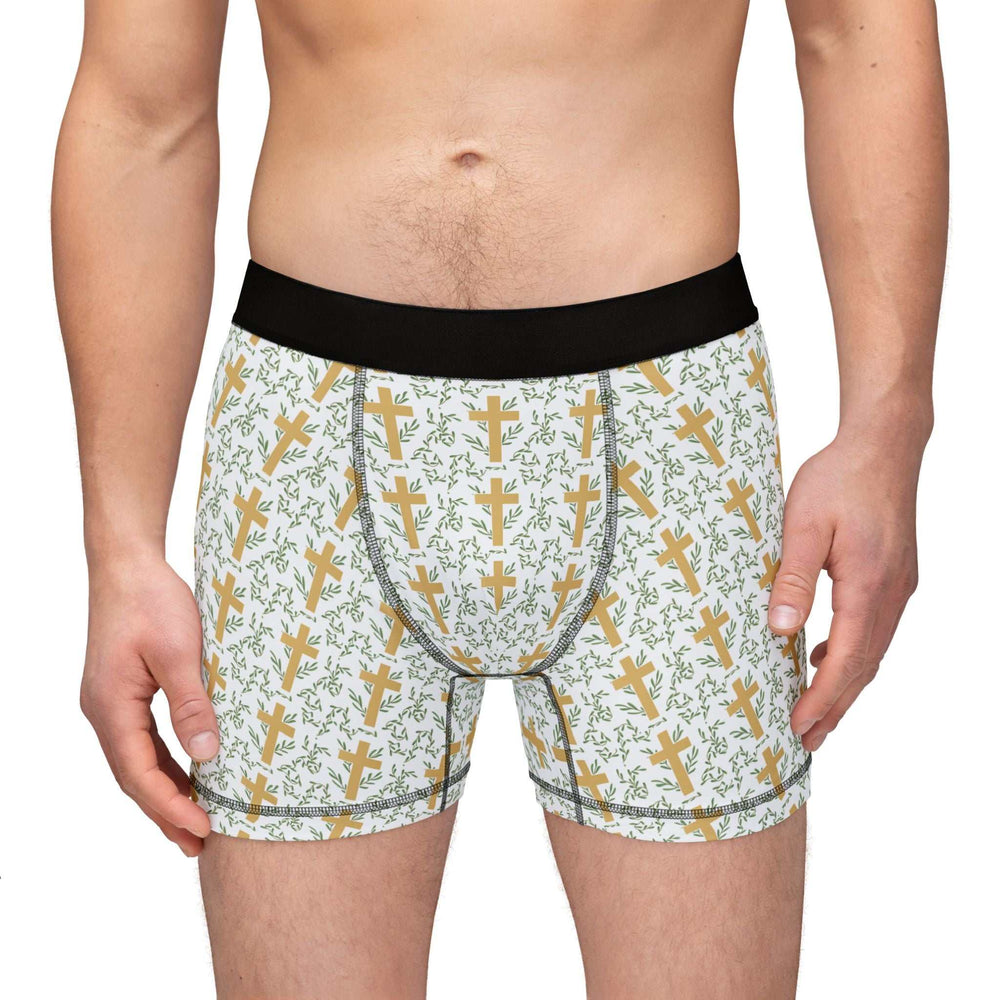 Men wearing Golden Cross Men's Boxers featuring stretchable, soft fabric with yellow cross and green leafy pattern, black waistband.
