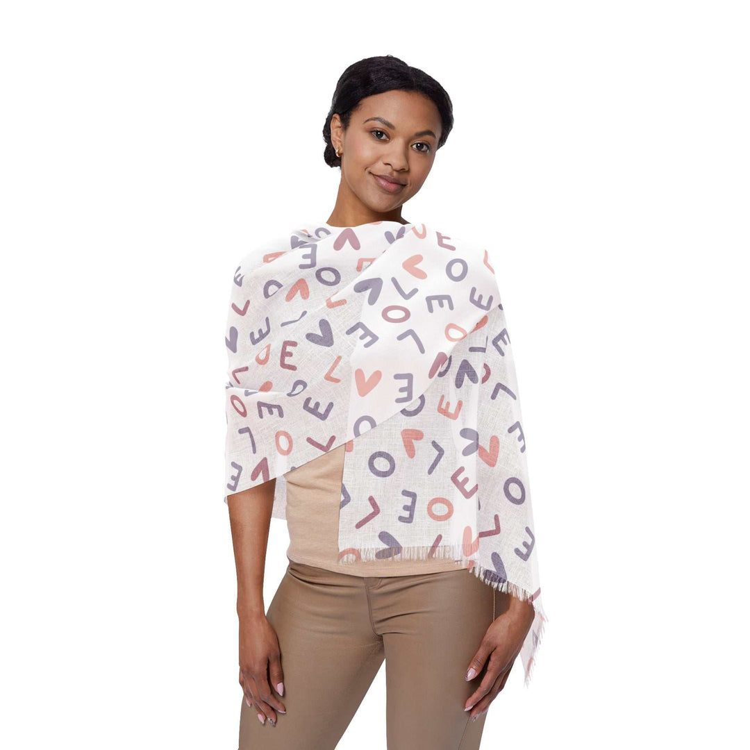 Woman wearing lightweight Love Pattern Light Scarf with transparent fabric and multicolored letters and hearts design