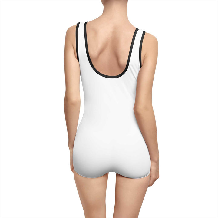 Back view of a woman wearing a white Blessed Vintage Swimsuit