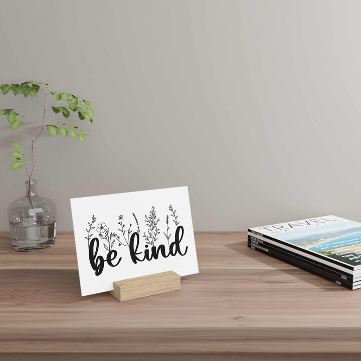 Be Kind Gallery Board with hand-crafted oak stand on wooden desk