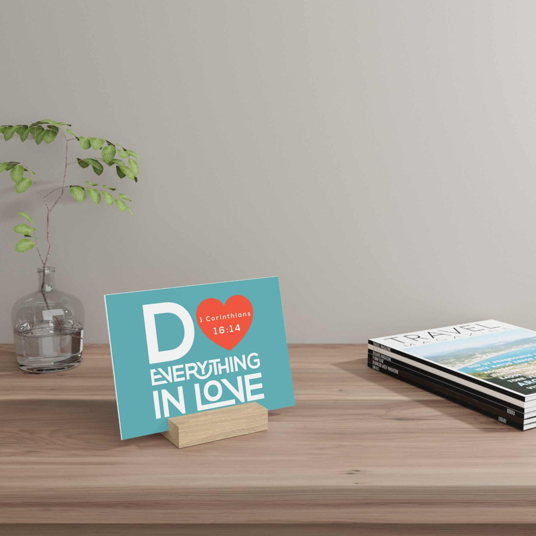 Bible Quote Gallery board on a wooden stand on desk