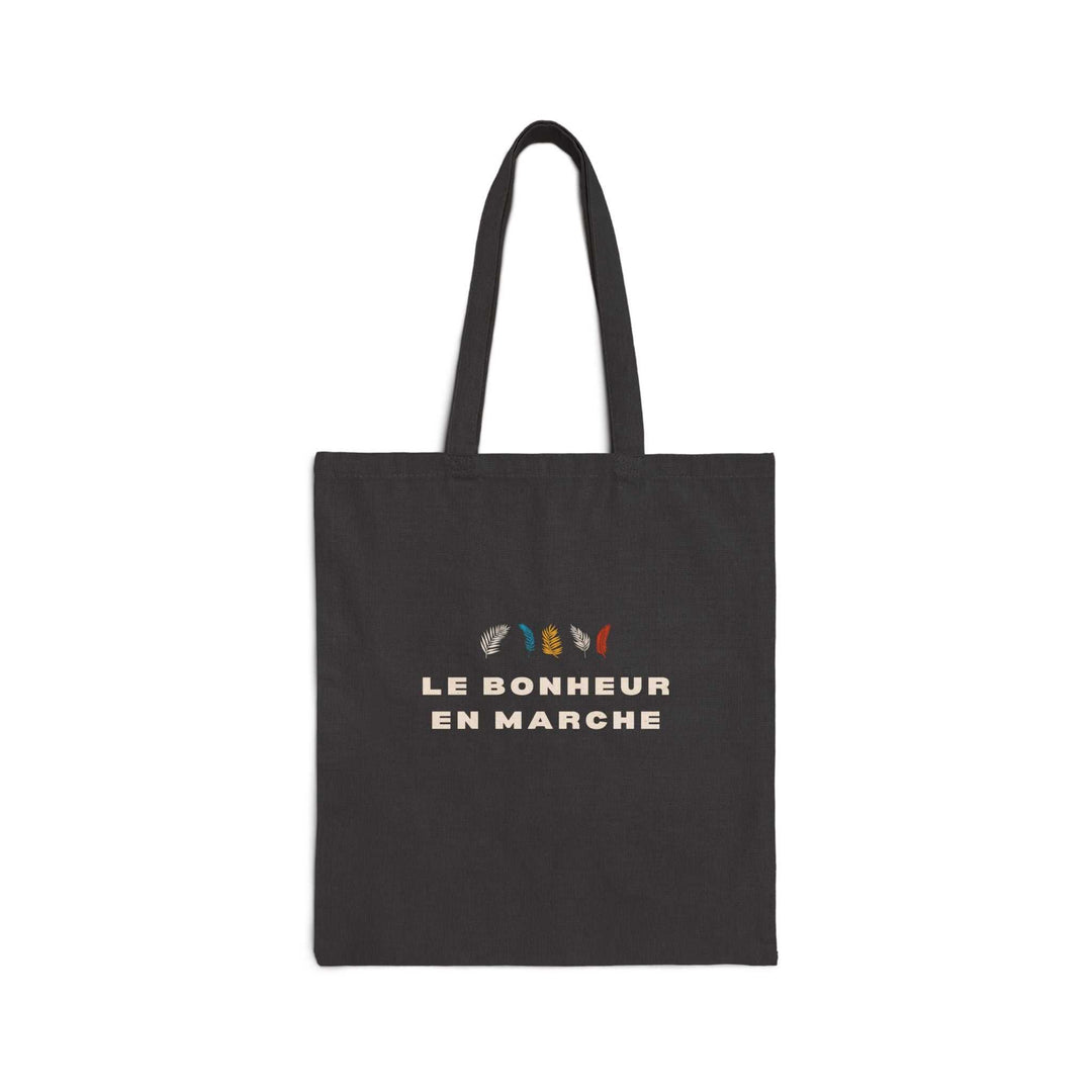 Black cotton canvas tote bag with "Le Bonheur en Marche" text and colorful feather design