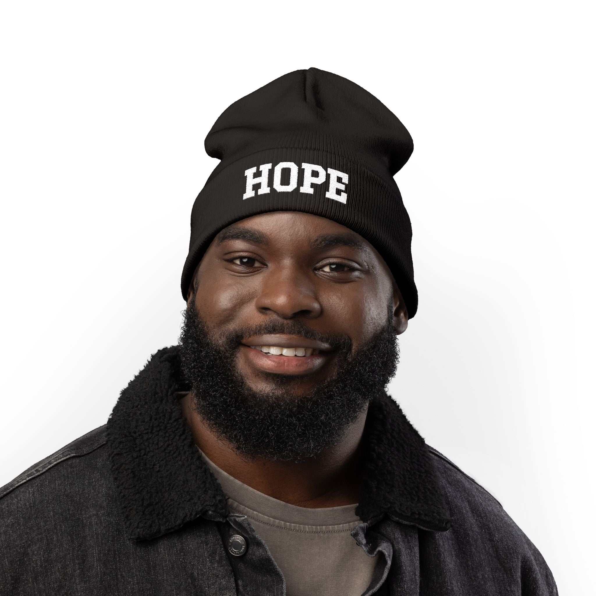 Black Hope Knit Beanie with white embroidery on man