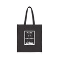 Black cotton canvas tote bag with "Make It Happen" motivational print and long handles