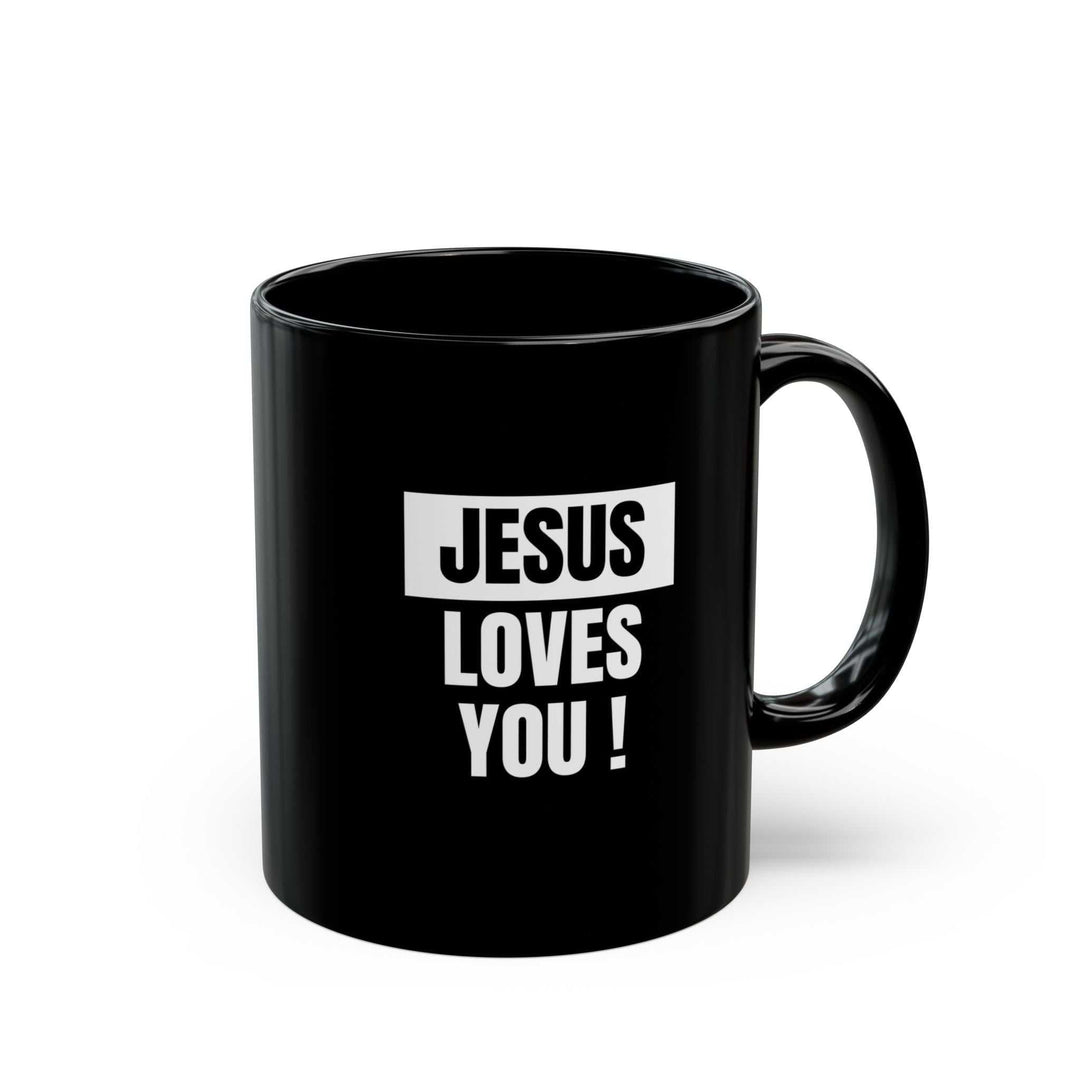 Black ceramic mug with "Jesus Loves You!" white text, 11oz microwave-safe faith mug with glossy finish and C-shaped handle