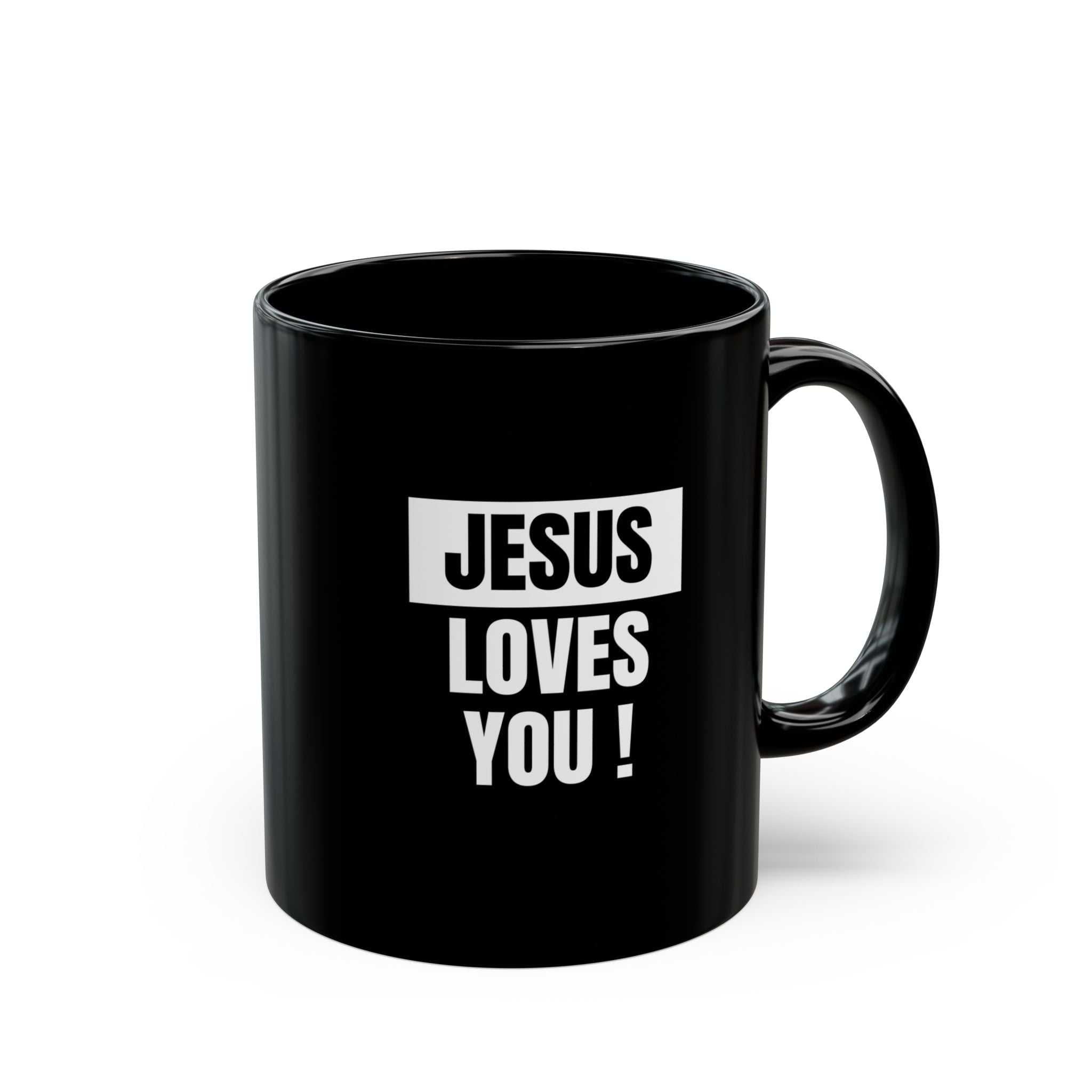 Black ceramic mug with white "Jesus Loves You!" text, 11oz, microwave and dishwasher safe.