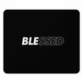 Black mouse pad with "BLESSED" text in white