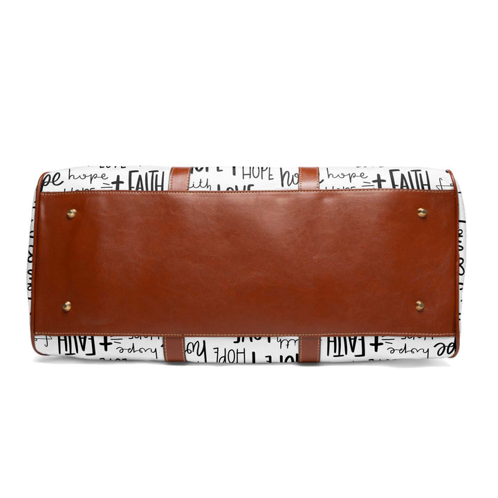 Bottom view of Faith Travel Bag showing brown PU leather base