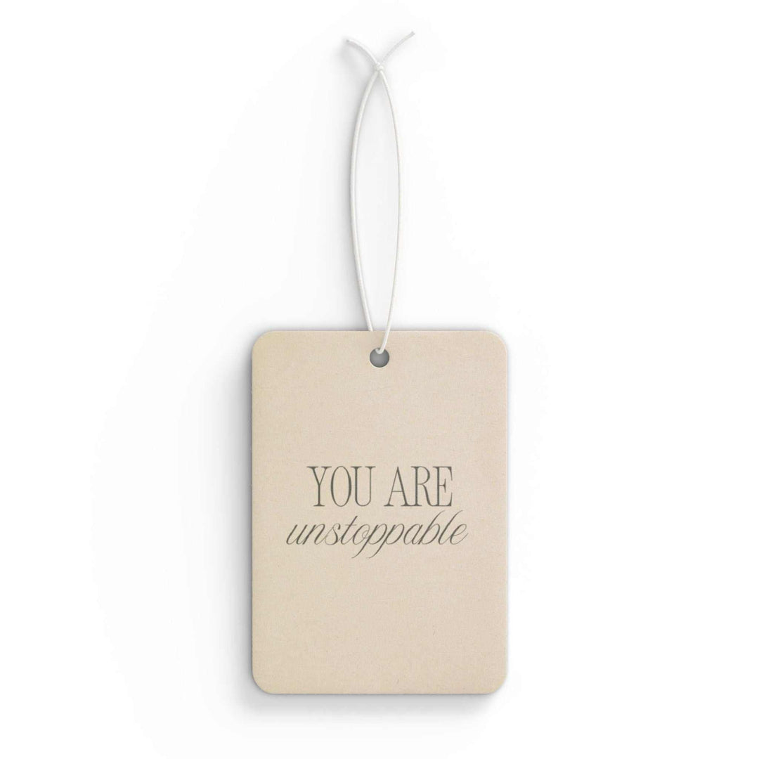 Car air freshener with "You Are Unstoppable" text