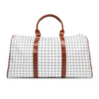 Christian Cross travel bag with brown PU leather handles and repeated cross design on white nylon material