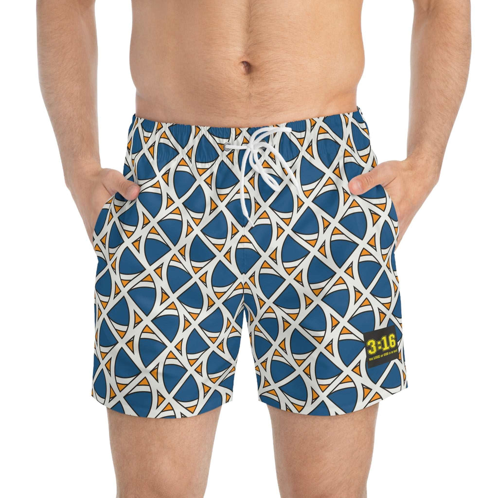 Close-up of male torso wearing swim trunks with geometric pattern
