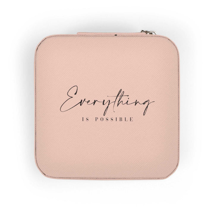 Compact motivational travel case with "Everything is Possible" text