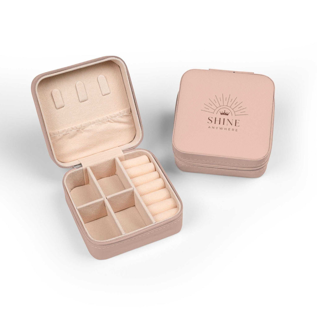 Compact pink Shine Anywhere Travel Case with plush interior