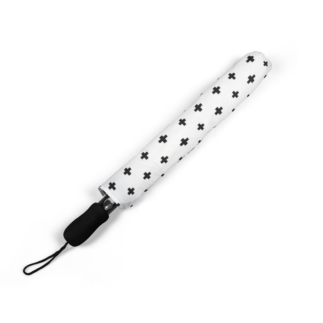 Compact white umbrella with black cross pattern