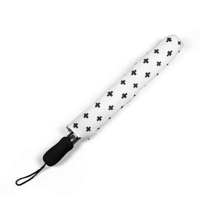 Compact white umbrella with black cross pattern
