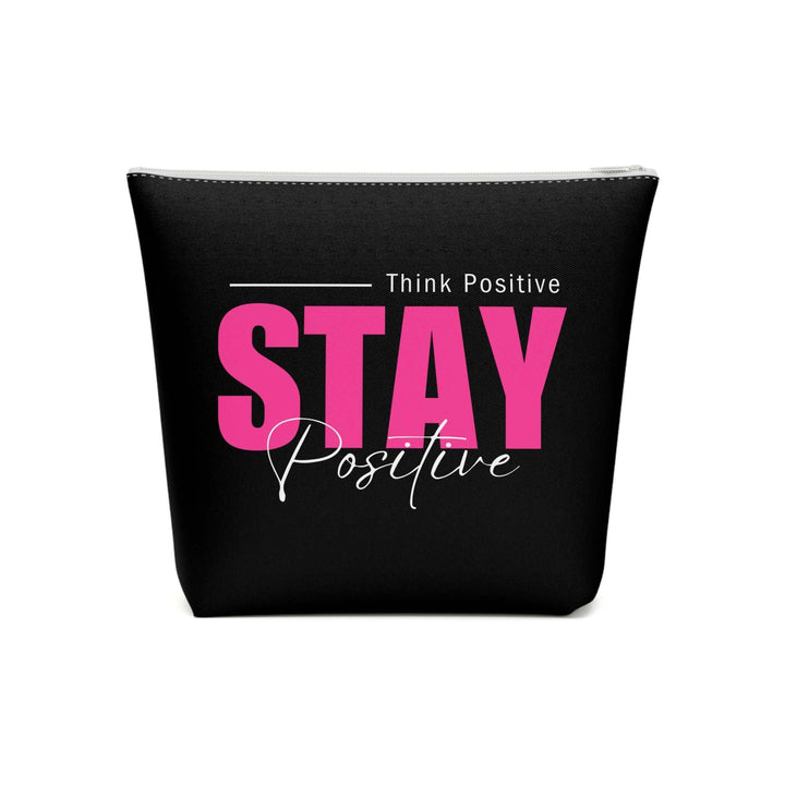 Cosmetic bag with "Stay Positive" pink and white text