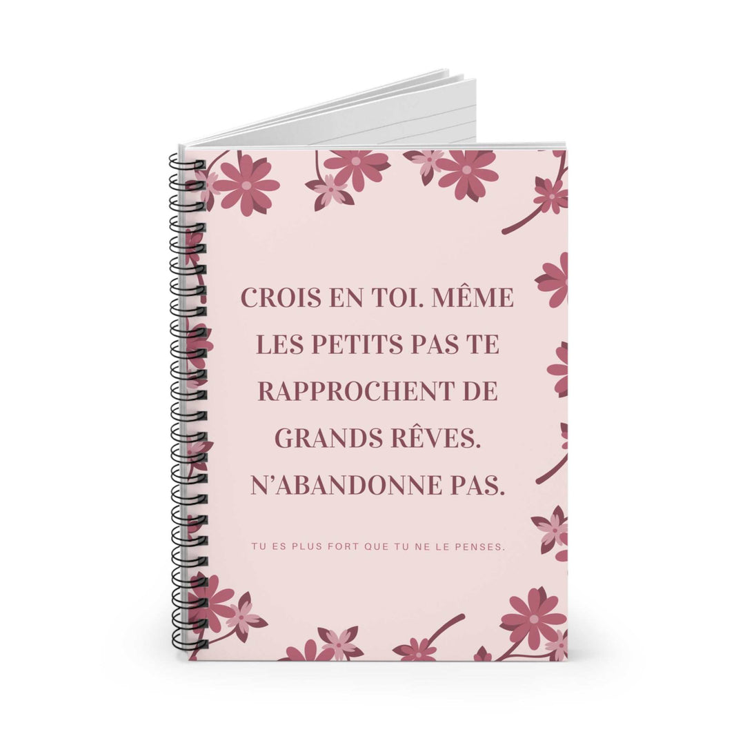 Spiral-bound Crois En Toi notebook with floral pink cover and motivational French quote