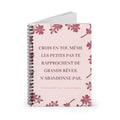 Spiral bound motivational notebook with pink floral front cover and lined pages