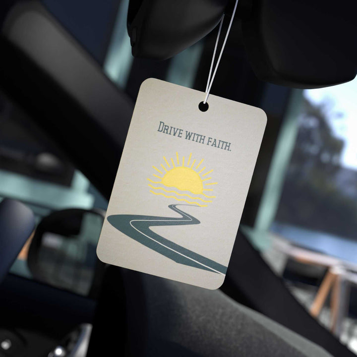 Drive With Faith car air freshener hanging in car