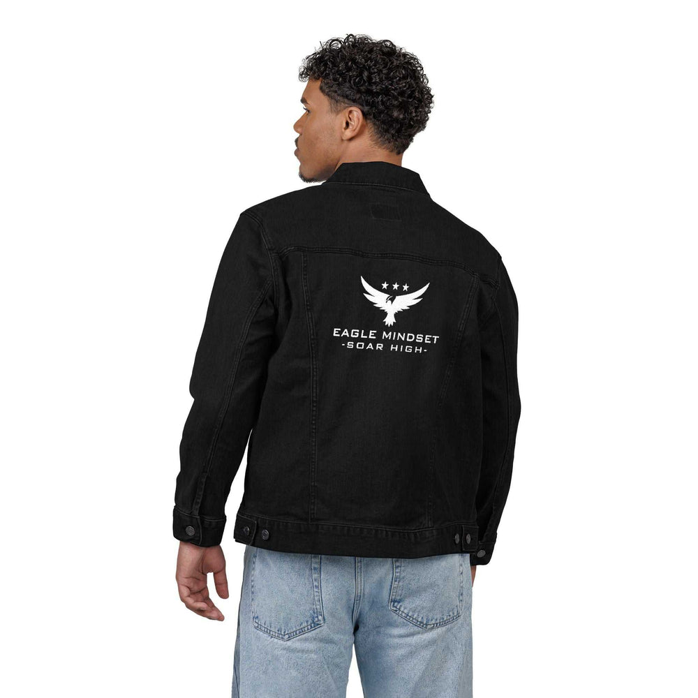 Man wearing black Eagle Mindset denim jacket with white eagle logo and "Soar High" text on back