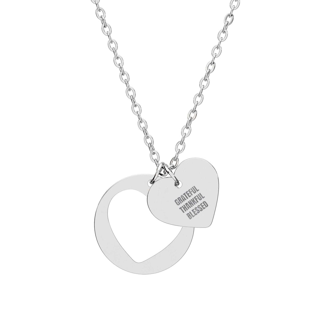 Faith & Gratitude Necklace with heart-shaped cutouts in stainless steel