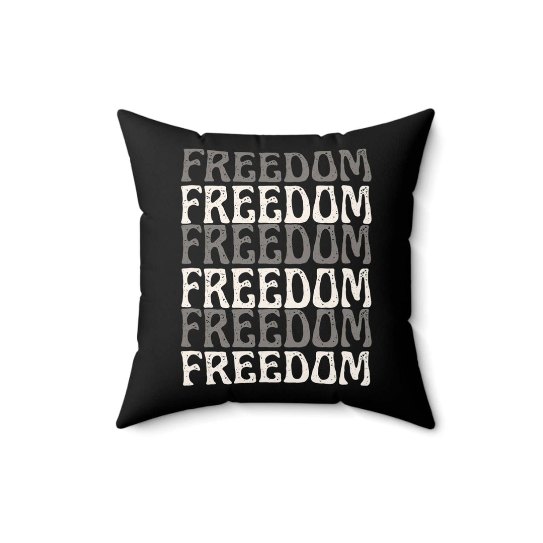 Freedom Pillow with repeated white and gray "FREEDOM" text design