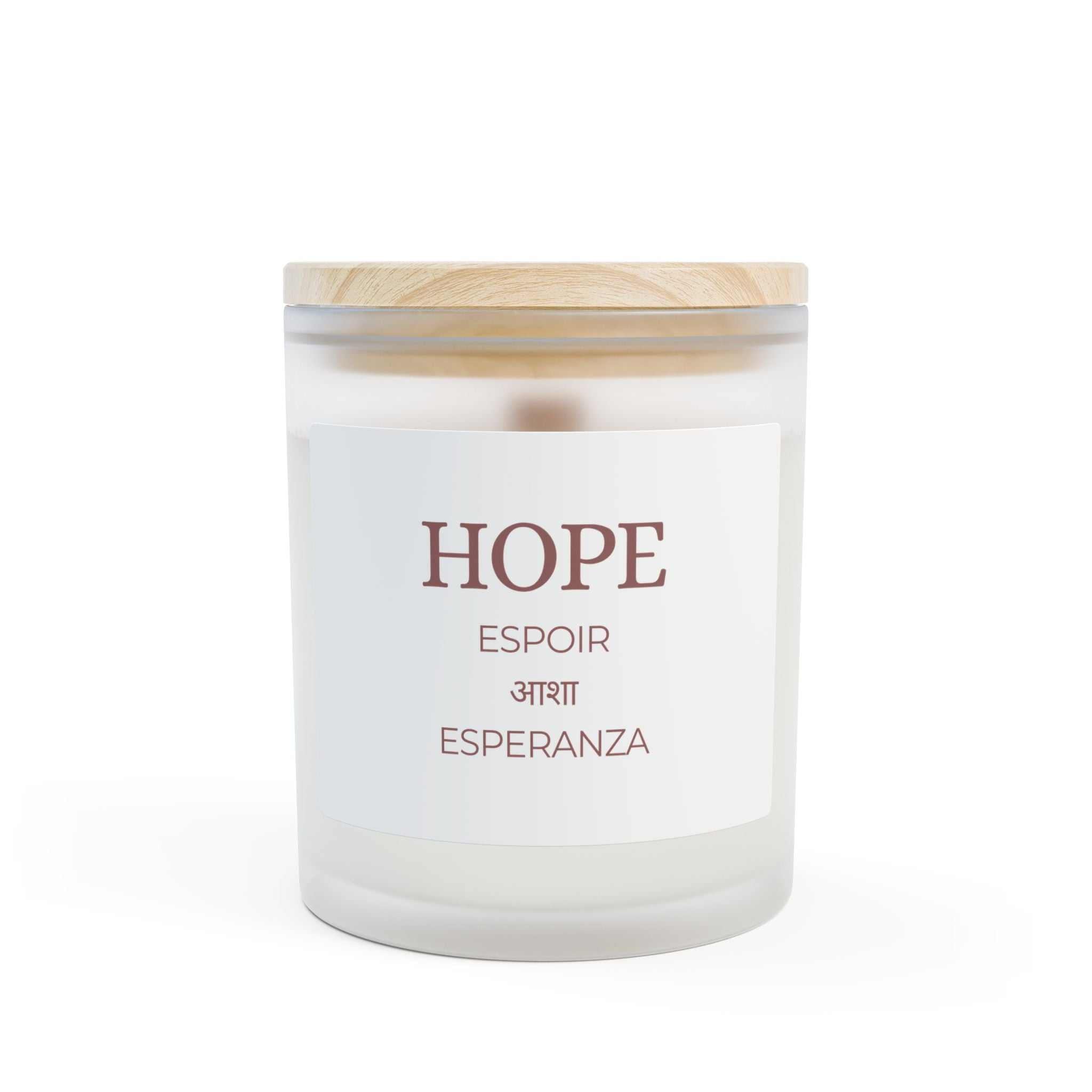 Natural off-white Hope Glass Candle with coconut soy wax, wooden wick, frosted glass vessel, and raw maple lid for 50-hour burn time.