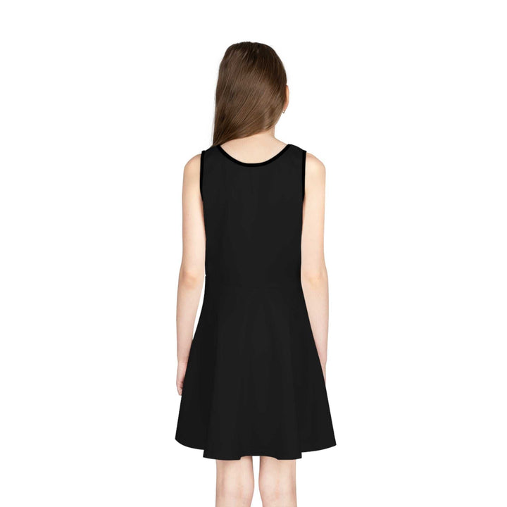 Back view of a black sleeveless sundress with A-line cut on a young girl