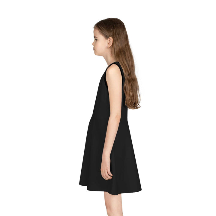 Girl wearing a black Love Sleeveless Sundress with an A-line cut and mid-length design.