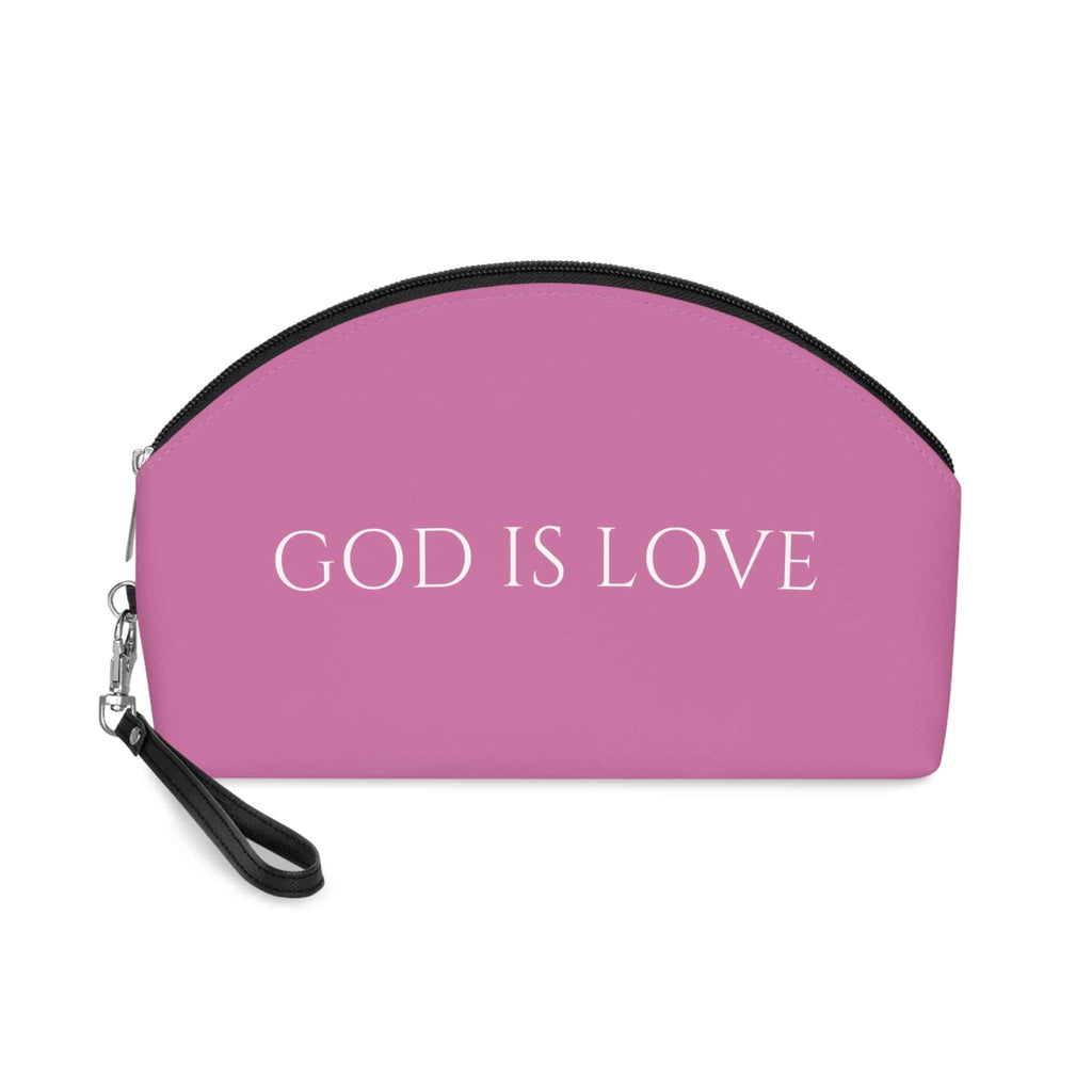 Pink "God Is Love" makeup bag with detachable black wrist strap and curved zipper design
