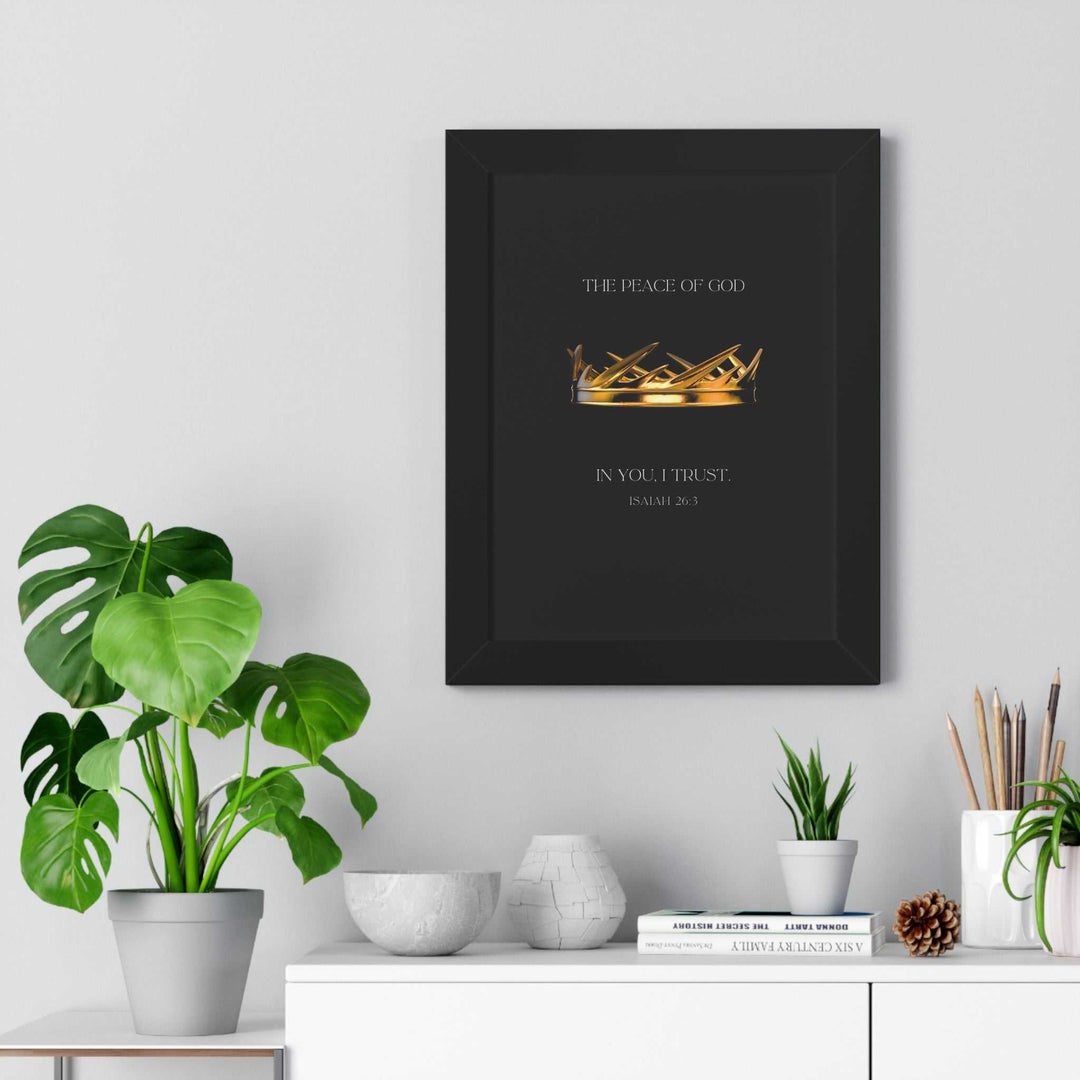 Framed God’s Peace Within poster with gold crown and scripture on black background above white shelf with plants and decor