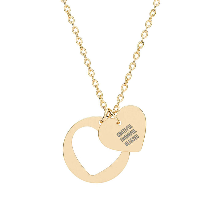 Gold Faith & Gratitude Necklace with heart cutout and engraved charms