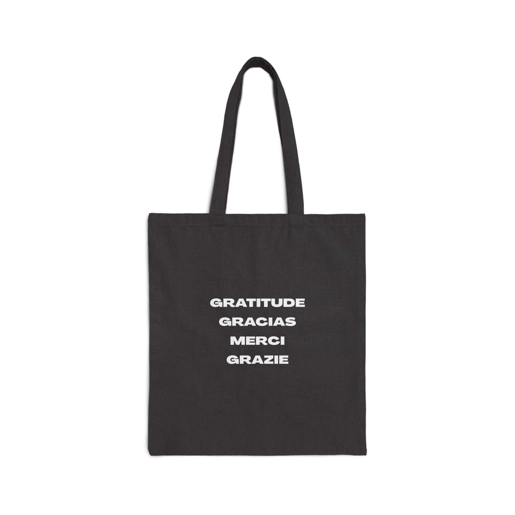 Black cotton canvas tote bag with gratitude text in multiple languages, durable and eco-friendly design