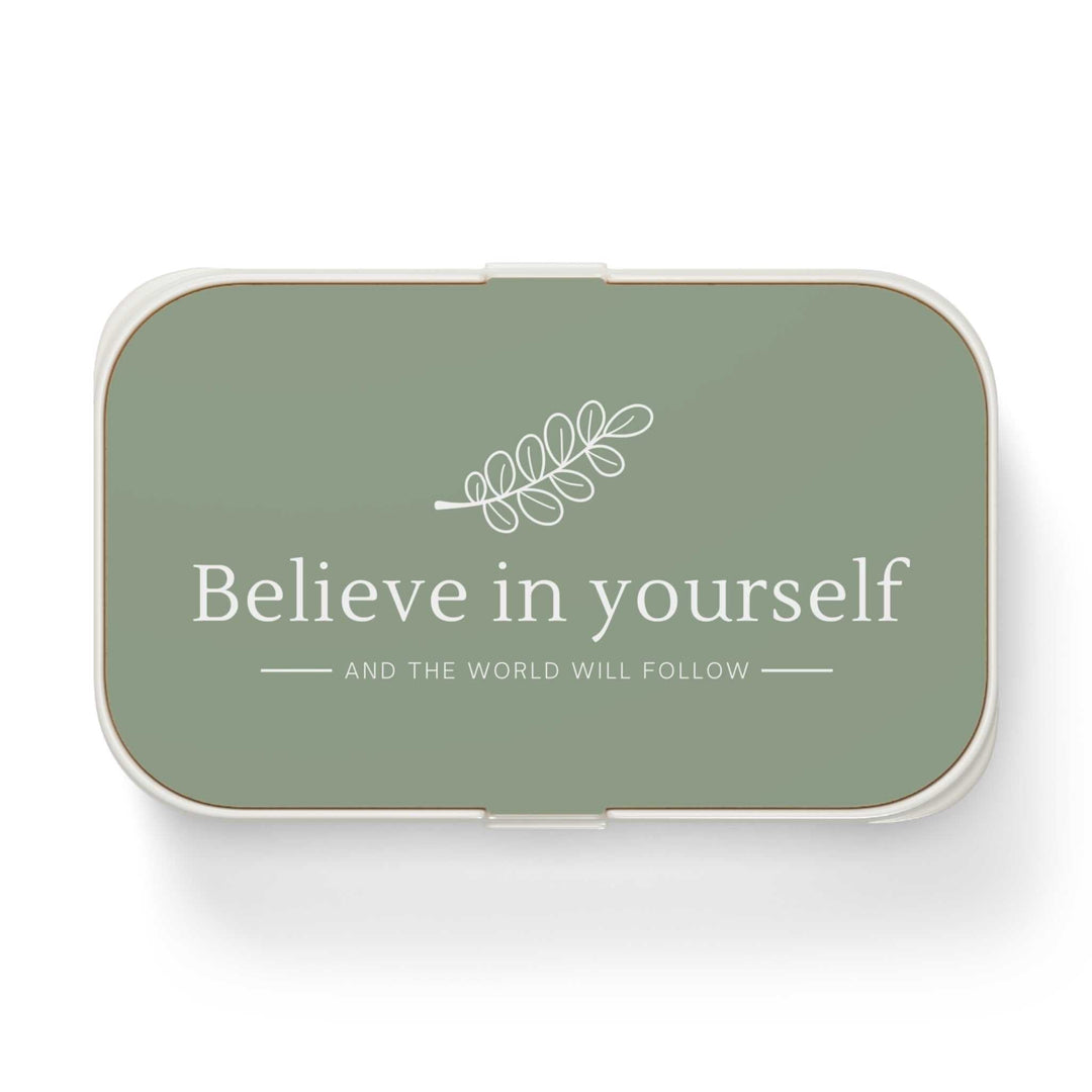 Green bento lunch box with "Believe in yourself" text