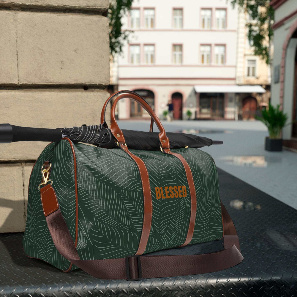 Green tropical travel bag with brown leather handles, gold zipper
