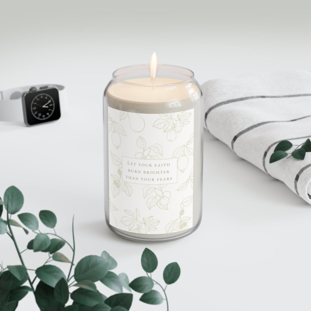 Hand-poured Faith Over Fear Candle with inspirational label burning