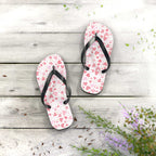 Heart pattern flip flops with black straps and cushioned white sole
