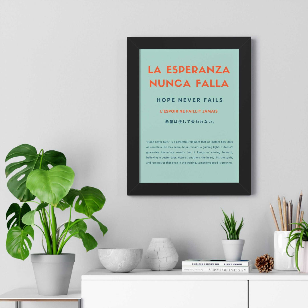 Framed "Hope Never Fails" inspirational poster in multiple languages hanging above white shelf with green plants and decorative items.